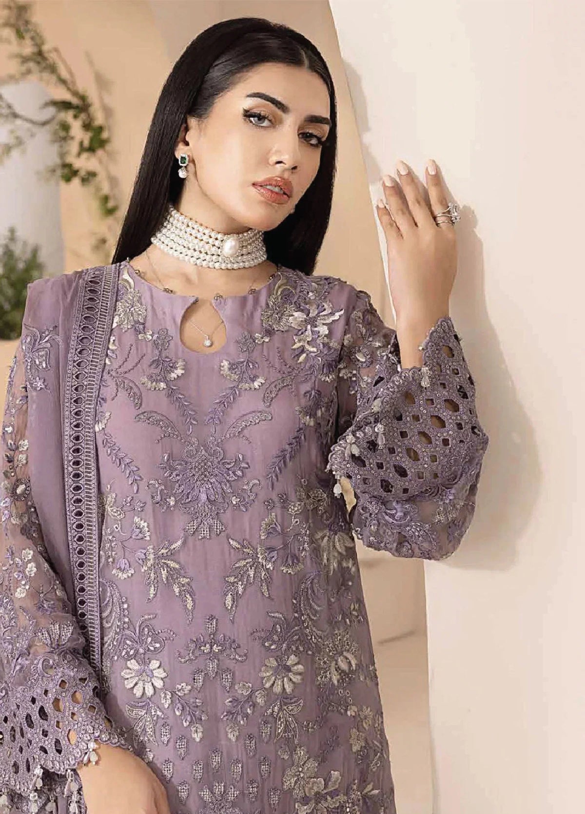 Close-up of D-07 Mauve chiffon shirt front embroidery and decorative sleeve cuffs, stitched styling reference
