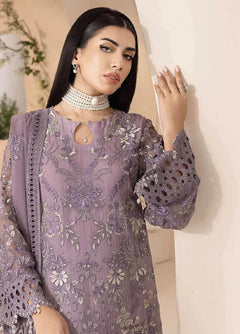 Close-up of D-07 Mauve chiffon shirt front embroidery and decorative sleeve cuffs, stitched styling reference