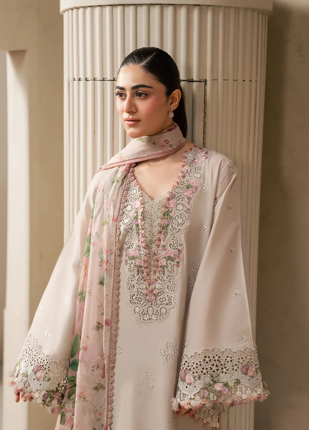 Clay beige Dhanak dress showing embroidered neckline, pink flowers and cutwork-style detailing