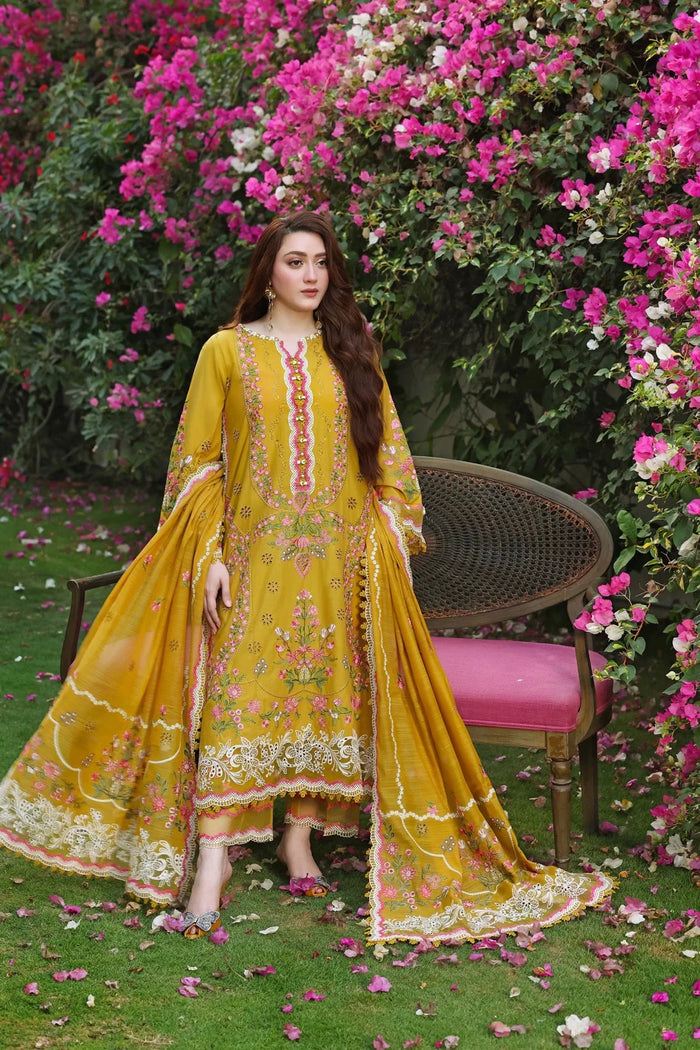 Mustard yellow Dhanak 3-piece unstitched dress with pink floral embroidery and matching dupatta, front styling view