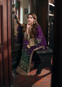 Purple and green Khadar 3-piece unstitched dress with patterned borders, seated styling view