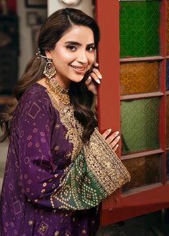 Gold-tone neckline and sleeve embroidery on purple and green Khadar 3-piece unstitched dress, detail view